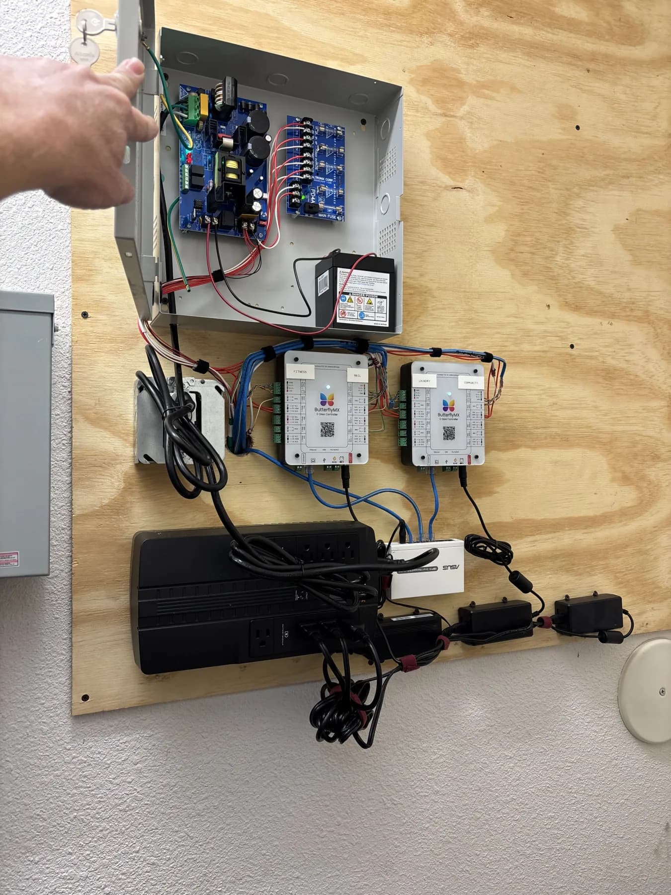Access-control power and controller equipment mounted together during installation